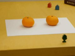 Иллюзия с мандаринами